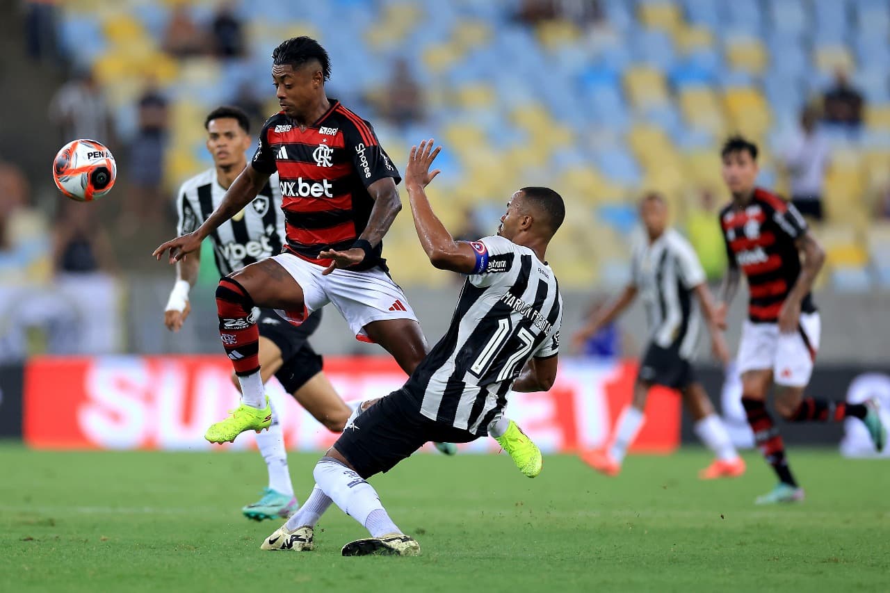 Bruno Henrique of Flamengo fights for the ball with Marlon Freitas of Botafogo during a Campeonato Carioca 2025 match between Flamengo and Botafogo at Maracana Stadium on February 12, 2025 in Rio de Janeiro, Brazil.