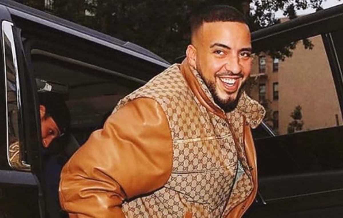 French Montana desembarca de carro sorrindo para fotógrafos