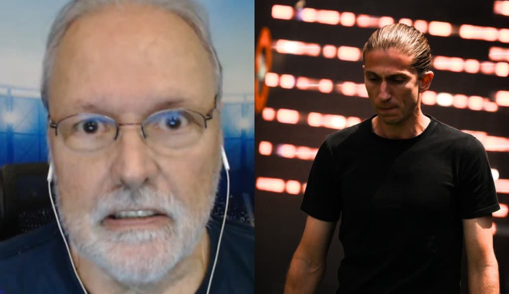 RMP com expressão de nervoso, ao lado de Filipe Luís, olhando para baixo em túnel