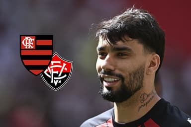 Paquetá ao lado dos escudos de Flamengo e Vitória