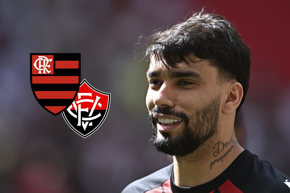 Paquetá ao lado dos escudos de Flamengo e Vitória